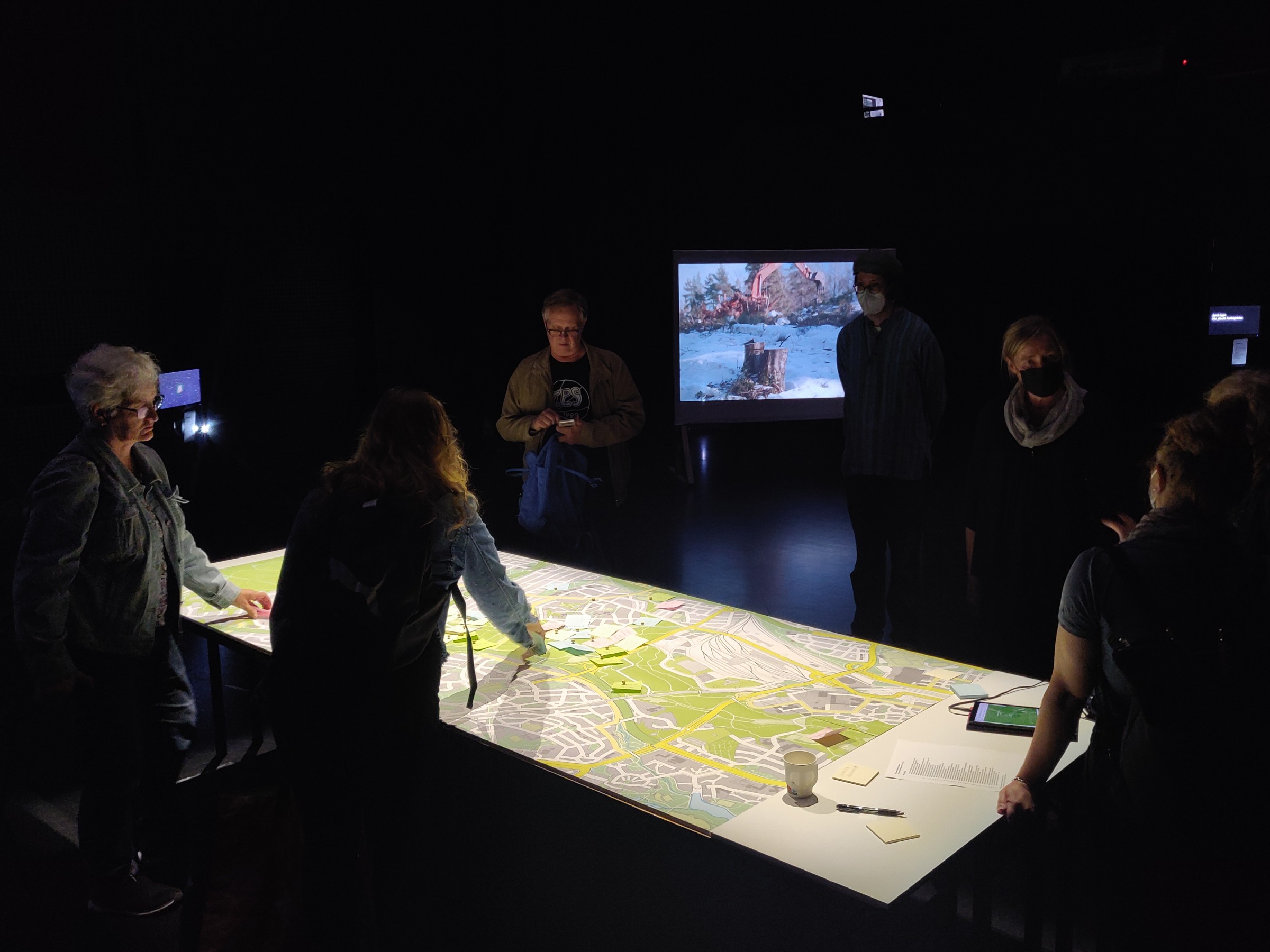 Central Park installation 2021 visitors around a map table